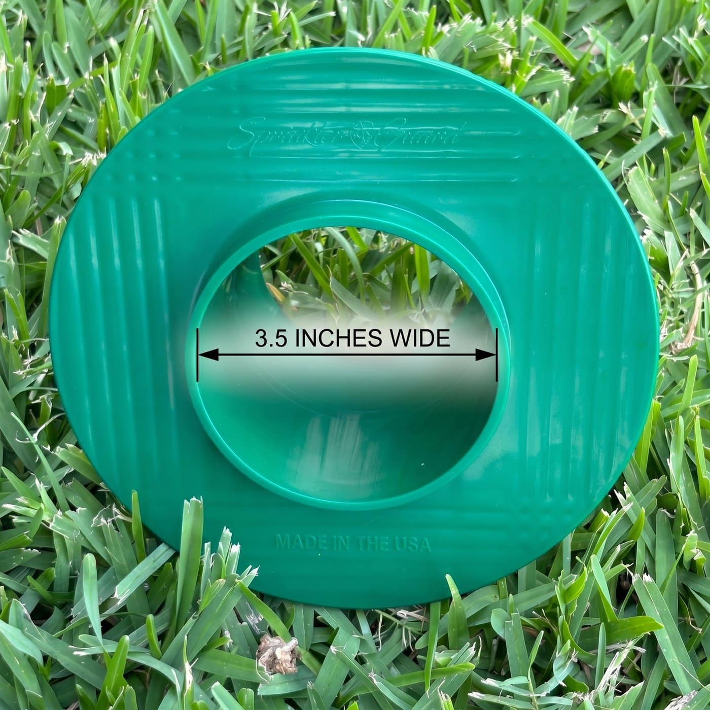 Sprinkler-Guard placed around a sprinkler head, fits any head up to 3 inches