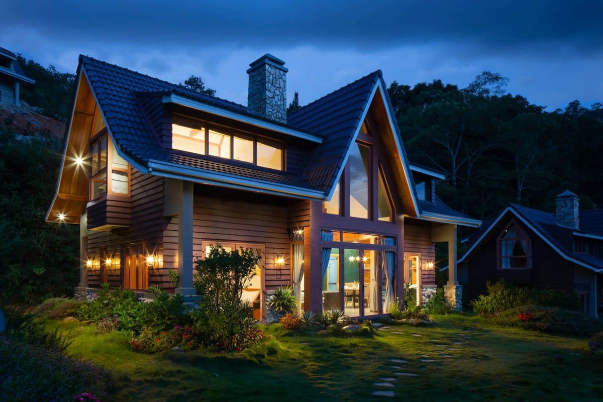 Suburban home exterior representing annual home maintenance and yard care